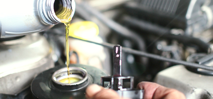 A bottle pouring brake fluid