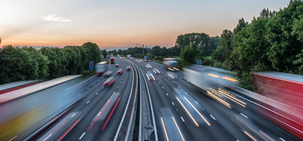 Vehicles driving through a busy highway