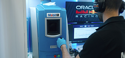Red Bull engineer using the Mobil 1 lab testing machine